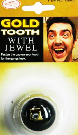 Зуб золотой с бриллиантом