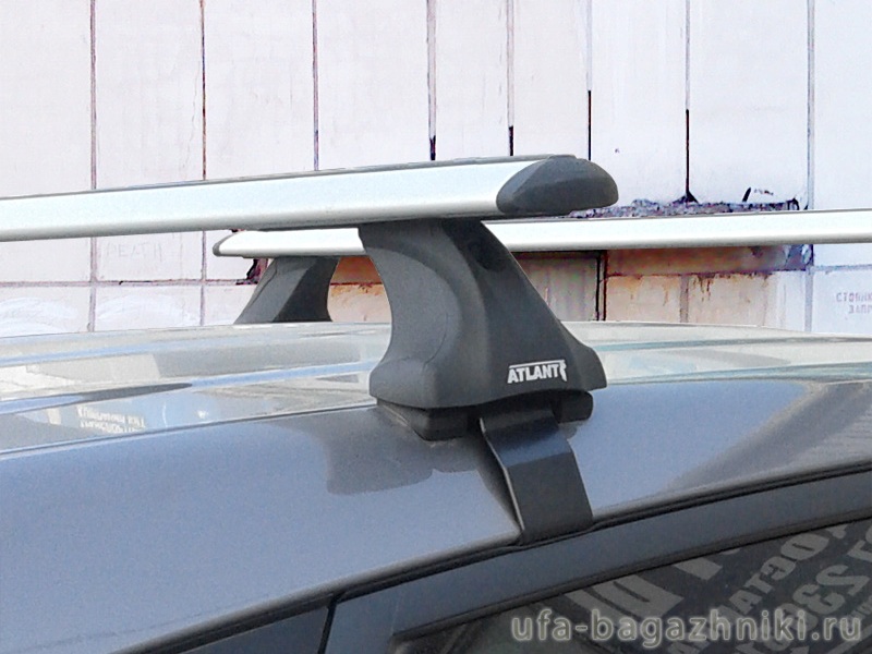 Багажник на крышу Hyundai ix35, без рейлингов, Атлант, крыловидные дуги, опора Е