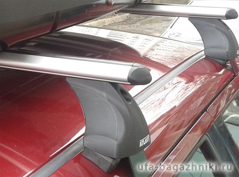 Багажник на крышу Skoda Fabia MK2 hatchback, Атлант, аэродинамические дуги, опора Е