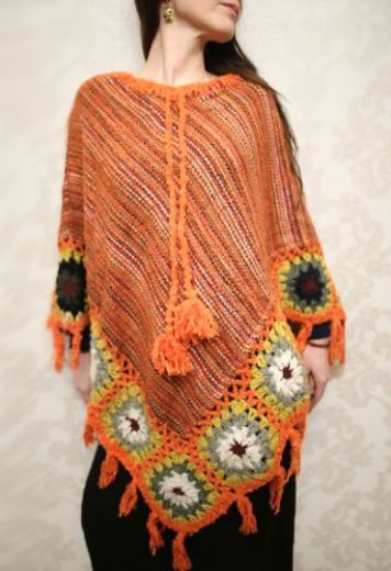 Оранжевое вязаное женское пончо Вудсток (Москва)