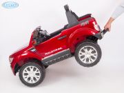 Детский электромобиль красный Форд Рейнджер - задняя ручка поможет легко выйти кататься !