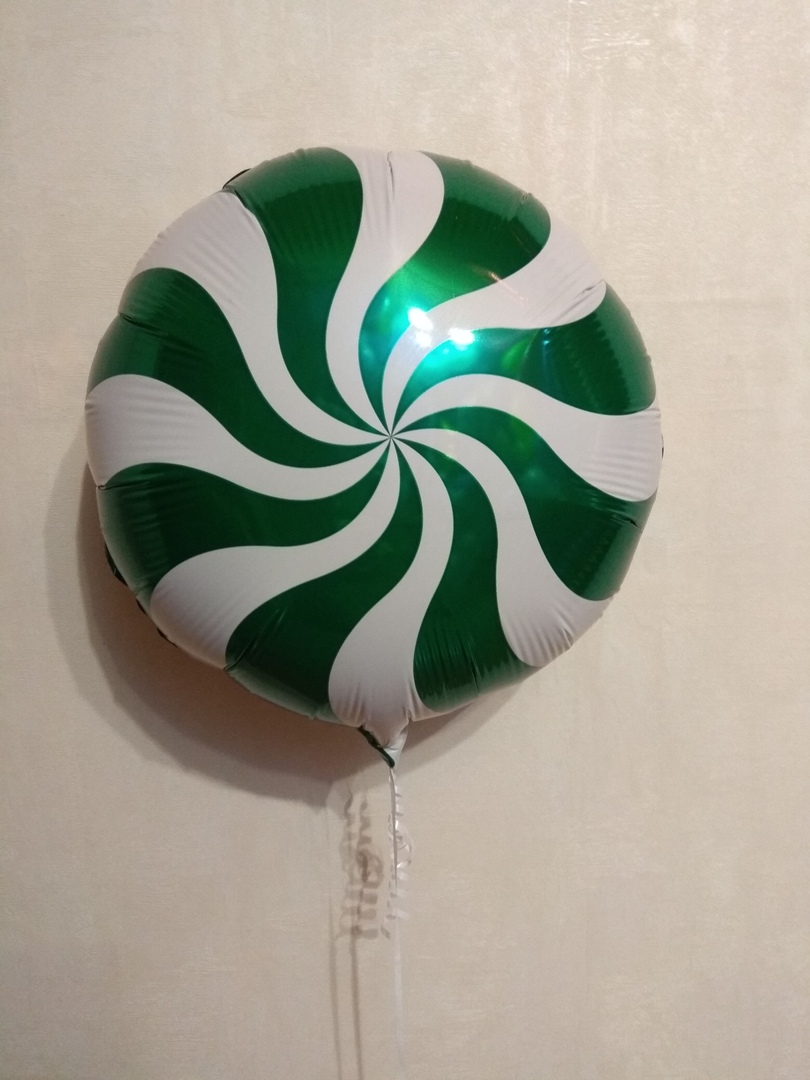 Леденец зеленый шар фольгированный с гелием