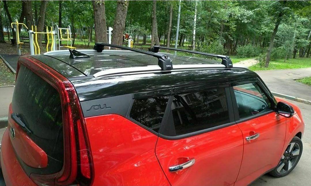 Багажник на крышу Kia Soul, Turtle Air 2, аэродинамические дуги на интегрированные рейлинги (черный цвет)