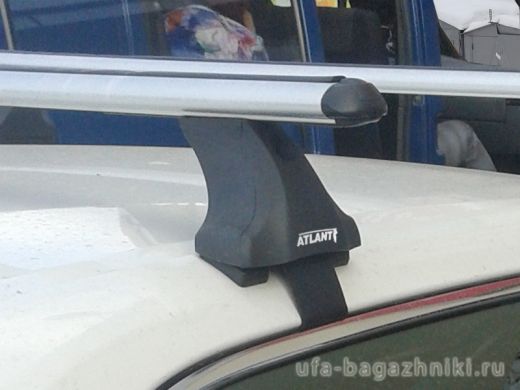 Багажник на крышу Toyota Camry XV50 2012-..., Атлант: аэродинамические дуги и опоры типа Е