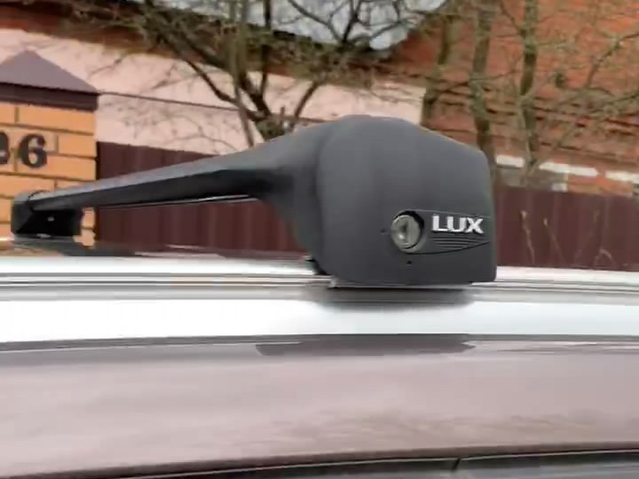 Багажник на крышу BMW X1 F48 2015-..., Lux Bridge, крыловидные дуги (черный цвет)