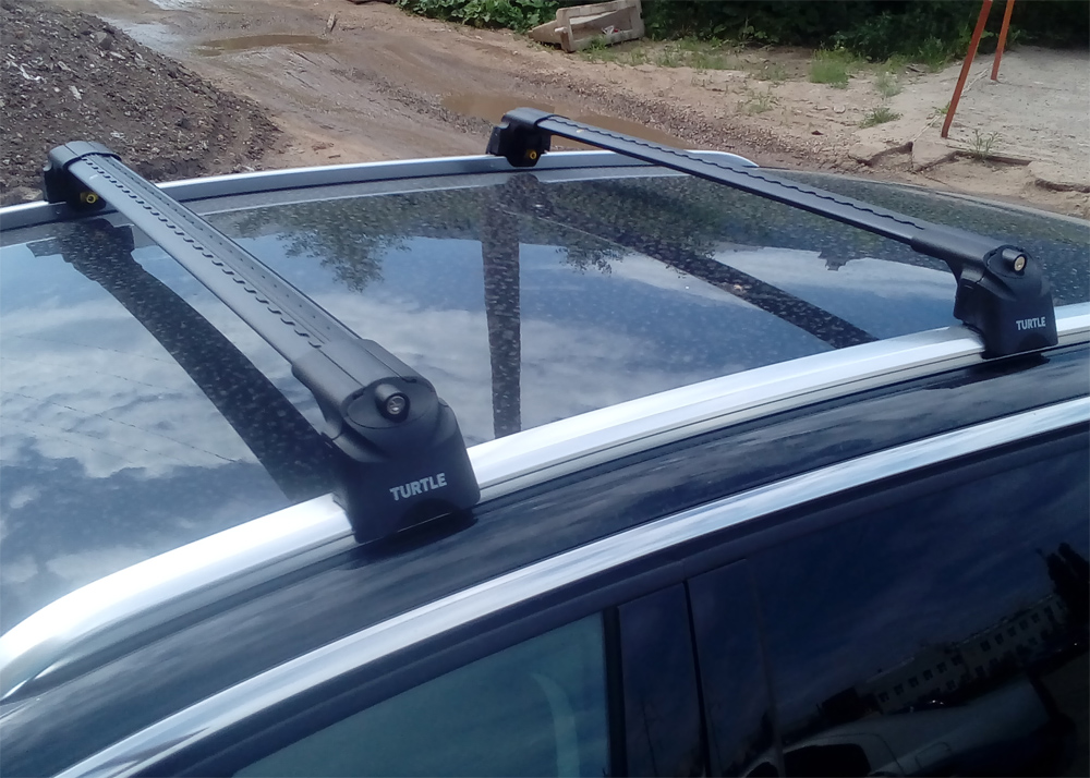 Багажник на крышу Peugeot 3008 2016-..., Turtle Air 2, аэродинамические дуги на интегрированные рейлинги (черный цвет)