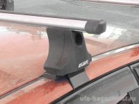 Багажник на крышу Kia Spectra, Атлант, аэродинамические дуги "Эконом"