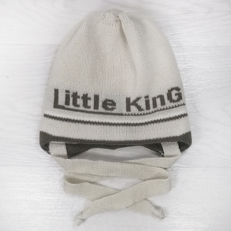 зн1023-01 Шапка вязаная на завязках с отворотом Little King бежевая