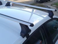 Багажник на крышу Volkswagen Passat B7, Атлант, аэродинамические дуги, опора Е