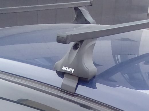 Багажник на крышу Toyota Prius, Атлант, стальные прямоугольные дуги (в пластике)