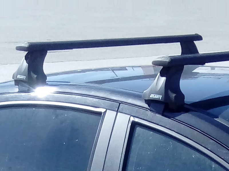 Багажник на крышу Toyota Auris E180, Атлант, крыловидные аэродуги (черный цвет)