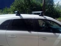 Багажник на крышу Mitsubishi ASX 2011-..., со штатными местами (планки под зацеп), Атлант, крыловидные дуги