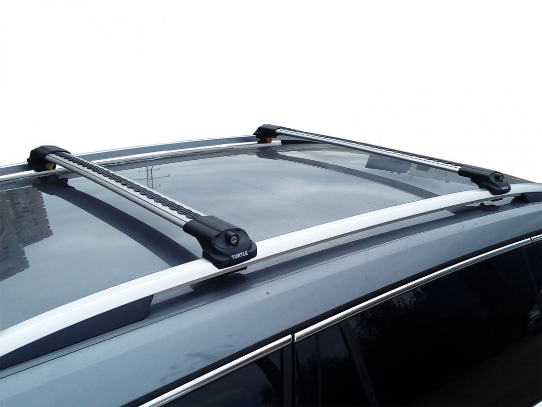 Багажник на крышу Skoda Kodiaq, аэродинамические дуги на рейлинги (серебристый цвет)