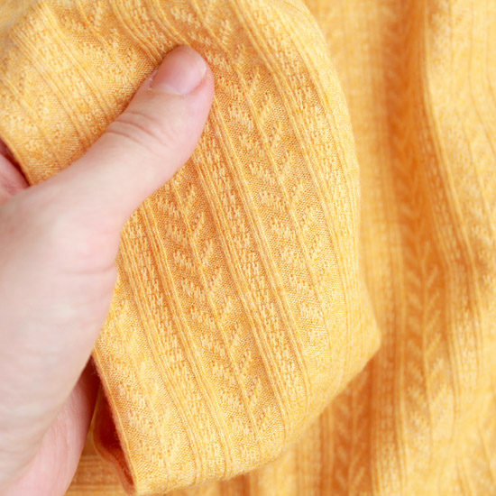 Лоскут трикотажной ткани - косичка желтая 50х37 см