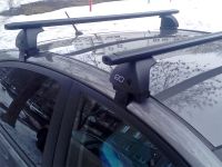 Багажник на крышу Kia K5 (2020-...), Евродеталь, аэродинамические дуги (черный цвет)